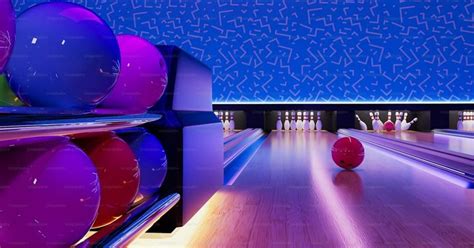 A Bowling Alley Filled With Bowling Balls And Bowling Pins Photo