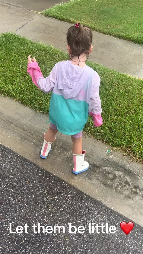 Let then be little #letthembelittle #playingintherain #livelikenooneel