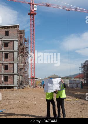 Builder With Hard Hat On White Stock Photo Alamy