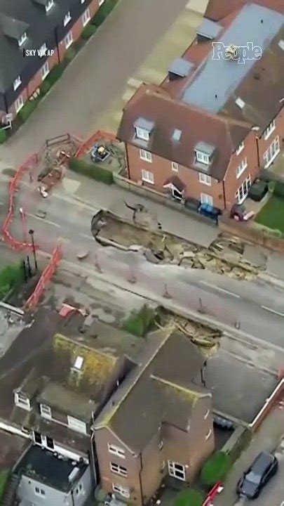 Giant Foot Sinkhole Swallows Up Street Residents Evacuated