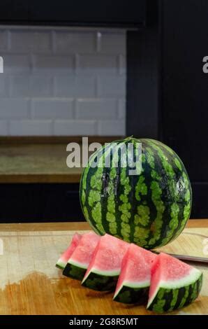 Watermelon Cut In To A Triangle Shape Stock Photo Alamy