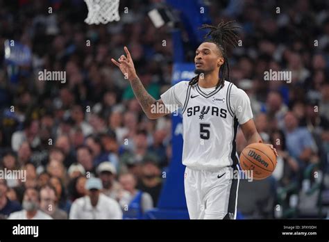 San Antonio Spurs guard Stephon Castle works the floor against the