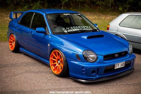 Blue Car With Orange Rims Subaru Impreza