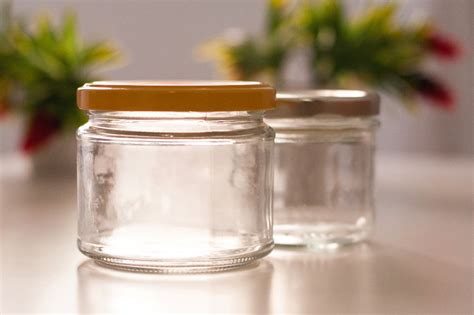 Clear Glass Jar With Yellow Lid Photo Free Jar Image On Unsplash