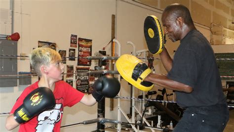 dog pound boxing party helps  dover mentorship programs punching