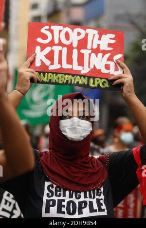 Protesters Hold Placards During The Demonstration The Rally Was A