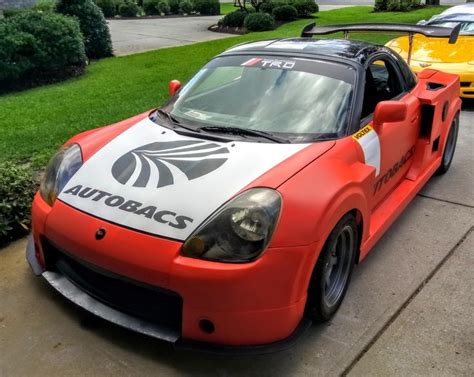 Toyota MR2 Two Parked Cars