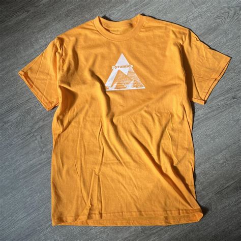 Frank Ocean Pyramids Yellow Graphic T Shirt Depop