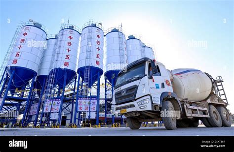 ZHANGYE CHINA FEBRUARY 25 2025 Builders Carry Out Concrete Mixing