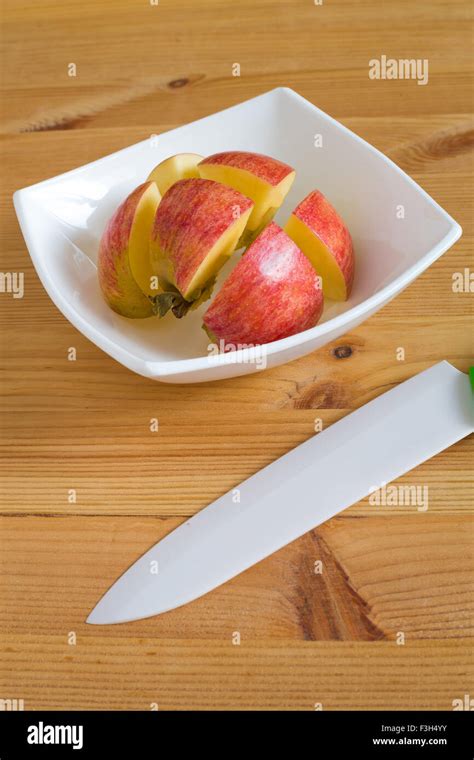 Ripe Sliced Organic Apple On A Wooden Background Stock Photo Alamy