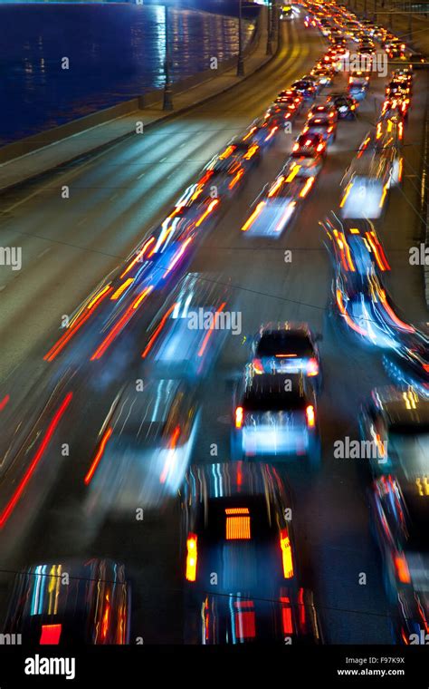 Slow Moving Traffic On Night Road Stock Photo Alamy