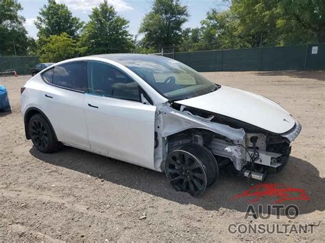 2021 TESLA MODEL Y ELECTRIC - 5YJYGDEE9MF204636 