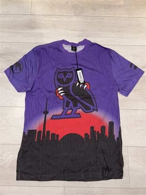 Octobers Very Own Ovo X Jurassic Park X Toronto Raptors Skyline Tshirt Grailed