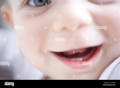 Baby smiling teeth hi-res stock photography and images - Alamy