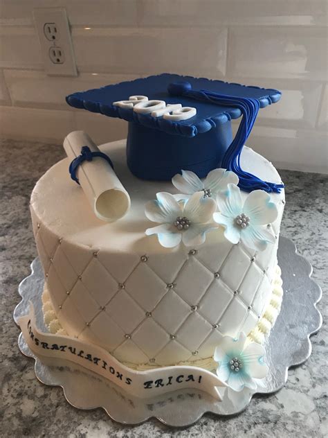 Graduation Cake With Blue And White Decorations