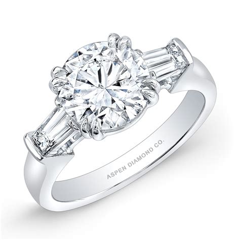 Round Brilliant Diamond Tapered Baguettes Engagement Ring In Platinum