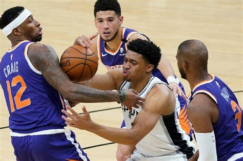 Nba Suns Take Care Of Business In Rout Of Short Handed Spurs Abs Cbn