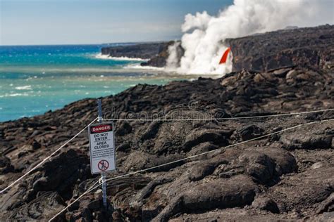 Volcano Danger Warning Sign Post In Solar De Manana Geyser Boli Stock