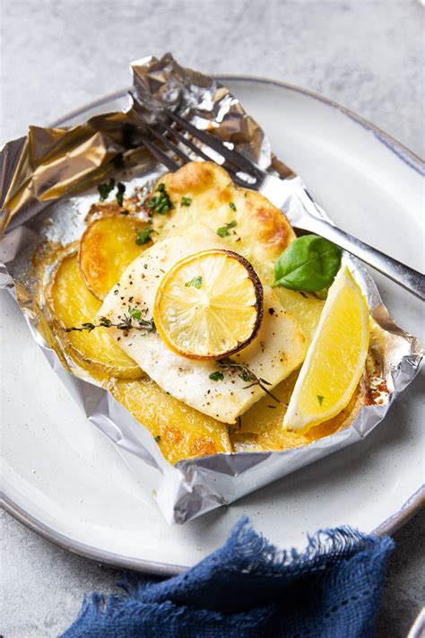 Baked Fish In Foil With Vegetables Garden In The Kitchen