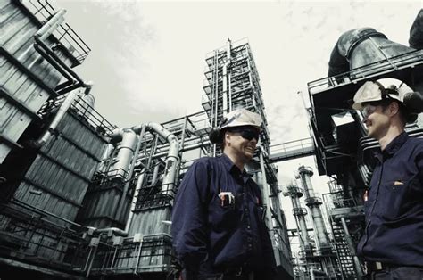 Oil and gas workers inside refinery industry ⬇ Stock Photo, Image by ...