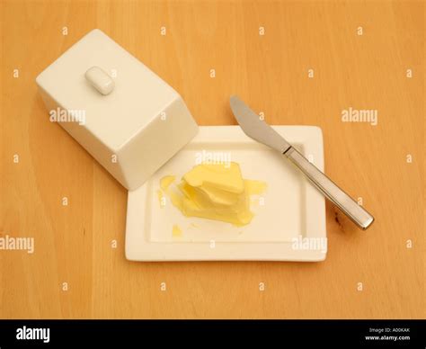 Butter in a Butter Dish and Knife Stock Photo - Alamy