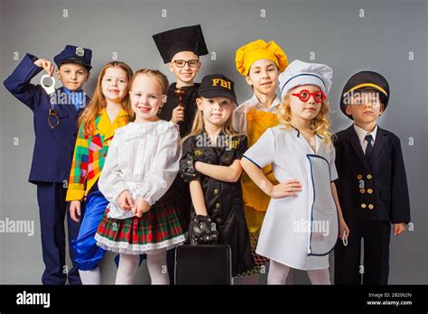 Group Of School Children Dressing Up As Professions Future Education