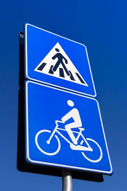 Premium Photo | Bicycle and pedestrian road sign