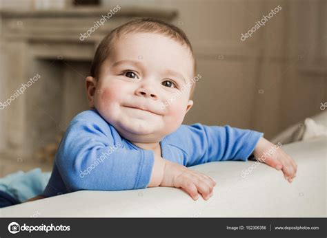 Baby boy smiling Stock Photo by ©NatashaFedorova 152306356