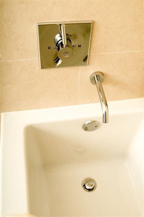 How to Remove a Pop Up Bathtub Plug and Unclog the Drain | Hunker