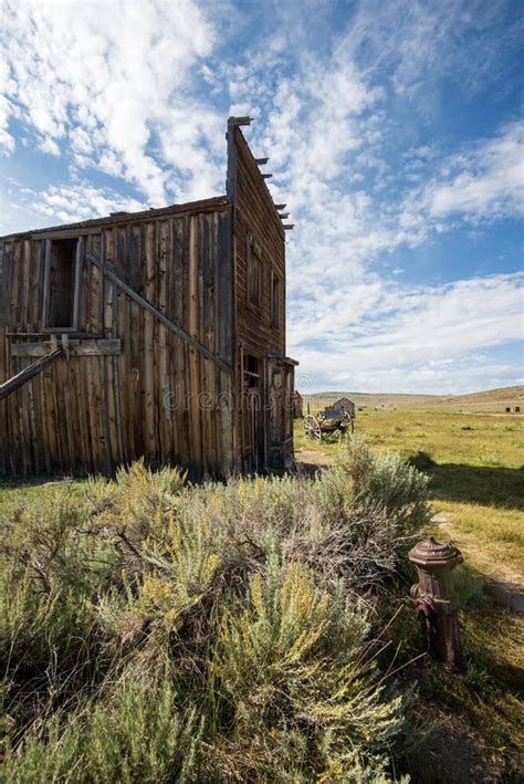 Vintage Old West Abandoned Buildings And Wagon In Ghost Town Bodie