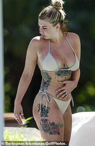 Olivia Buckland Slips Her Enviable Curves Into A Nude Barely There