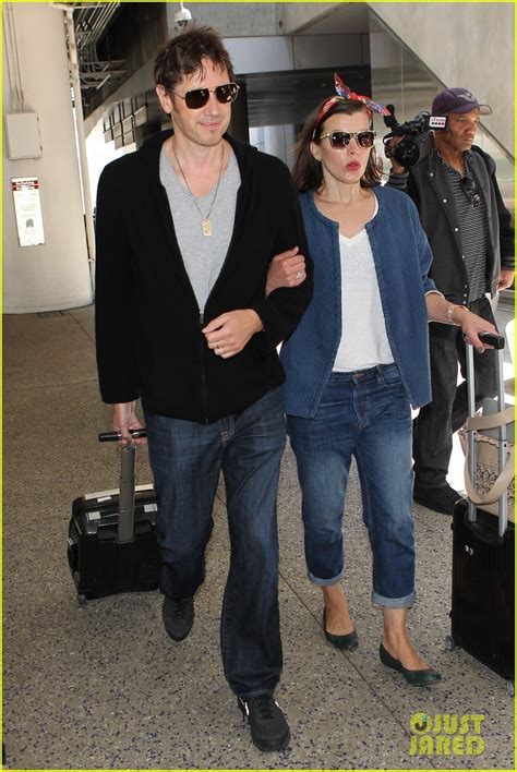 Milla Jovovich Husband Paul W S Anderson Look So In Love At LAX