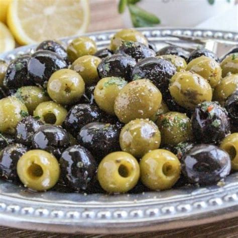 Garlic And Herb Marinated Olives Olive Recipes Marinated Olives