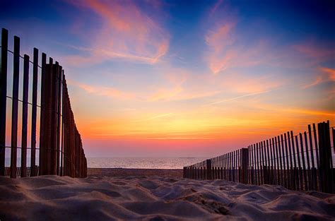 Sunrise In Ocean City MD Photograph By John Daly Fine Art America