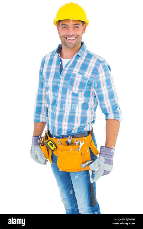 Portrait Of Smiling Handyman Wearing Tool Belt Stock Photo Alamy