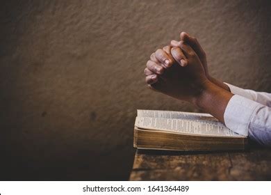 Praying Hands On Bible Photos Images Pictures Shutterstock