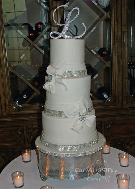 Elegant White Bow And Bling Wedding Cake