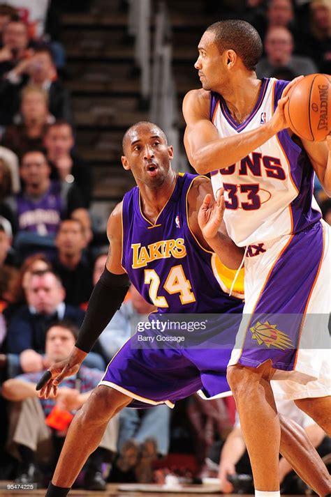 Kobe Bryant Of The Los Angeles Lakers Guards Grant Hill Of The News