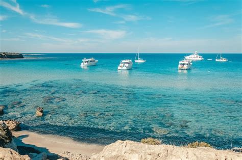 Premium Photo Tourist Boats Are Mooring At Blue Lagoon At Akamas