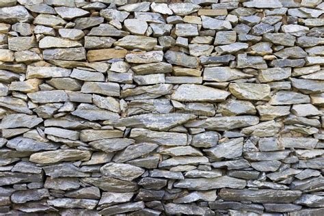 Grey stone wall background stock photo. Image of detail - 185193902