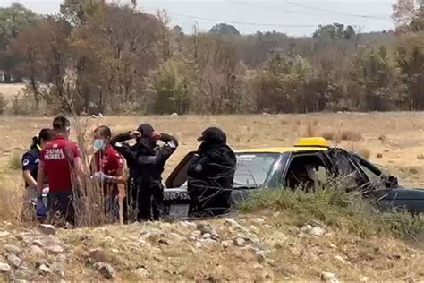 Descubren cadáver maniatado en la cajuela de un taxi