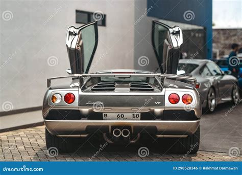 Silver Lamborghini Diablo Vt 60 Coupe Supercar On Gas Station Parking