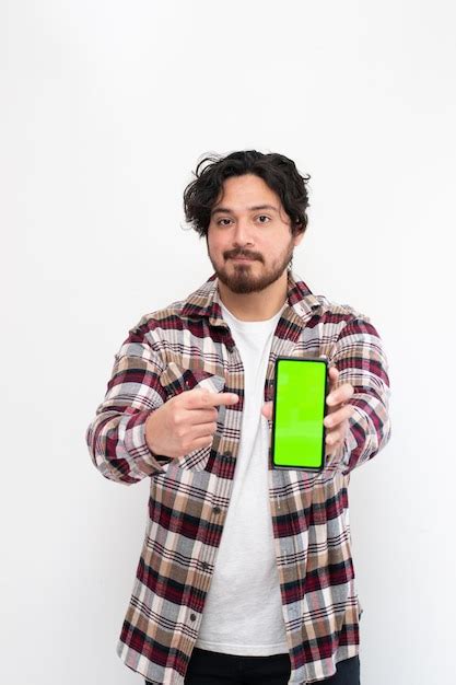 Premium Photo Vertical Portrait Of Man Holding Cell Phone With Chroma