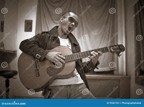 Singing with Guitar stock photo. Image of room, music - 9546194