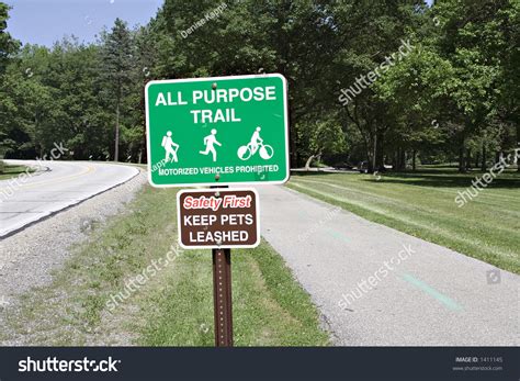 Signs Posted Along An All Purpose Walking Jogging Riding Bicyle Path