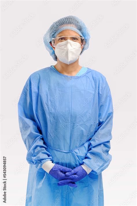 Studio Portrait Of 40s Hispanic Female Surgery Doctor Or Researcher