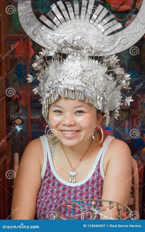 Portrait Of Miao Woman With Silver Horn Hatthe Miao People Form One Of The Largest Ethnic