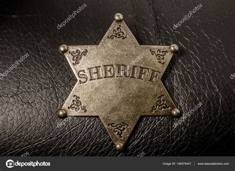 Sheriff Badge On Black Leather Texture Background — Stock Photo