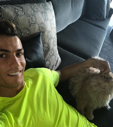 The 30 Cutest Pics Of Footballers With Animals