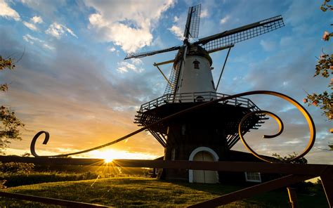 Download Cloud Sunbeam Sunrise Man Made Windmill Hd Wallpaper